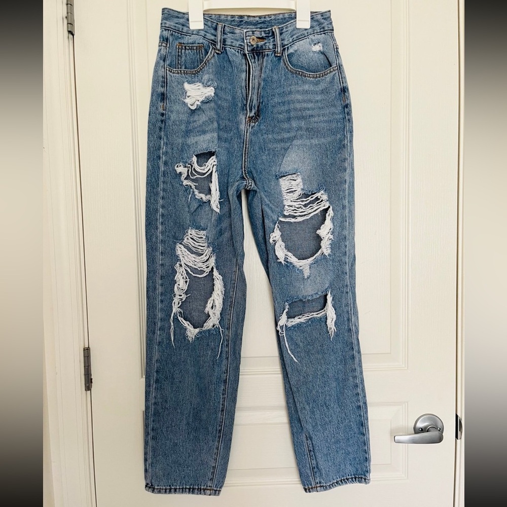 Distressed Blue Denim Jeans